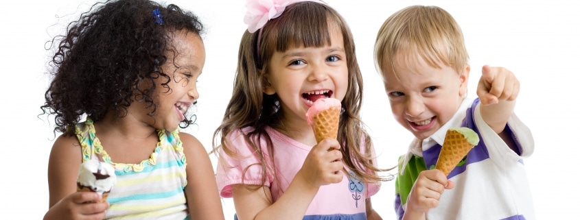 Happy kids eating ice cream
